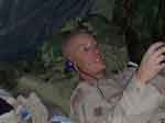 Morberg doing what he did during down time...listening to music and reading.