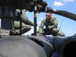 Landon on a preflight check of one his Black Hawk helicopters.