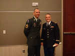 Attached is a photo of 1LT Mark Noziska (right) and I at his commissioning ceremony. I had the honor of mentoring him and receiving his first salute.